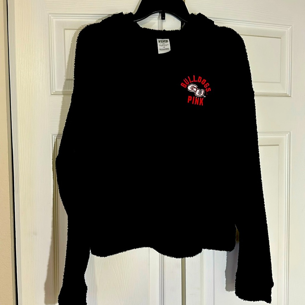 Pink Victoria Secret cropped hoodie.